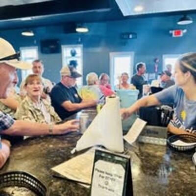 Bartender serving customers