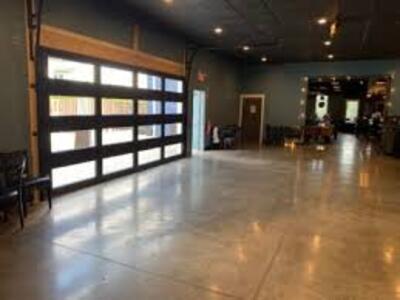 Open garage doors to patio